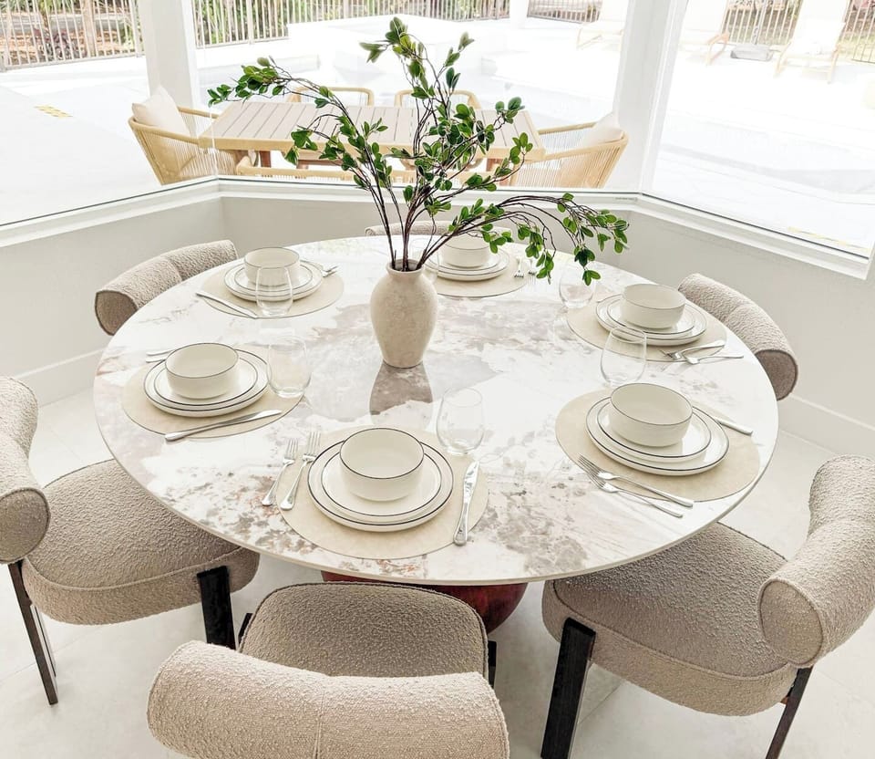 Set the table for long, easy meals.
This dining space seats up to 10, with an extra outdoor table ready to join.
Enjoy meals overlooking the pool and garden, where conversations linger and the outdoors becomes part of the moment.