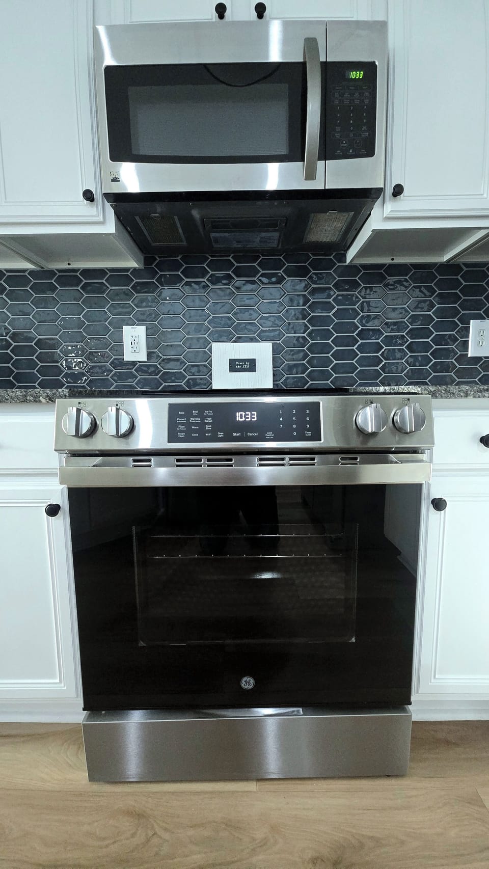 Stainless steel stove with backsplash, 