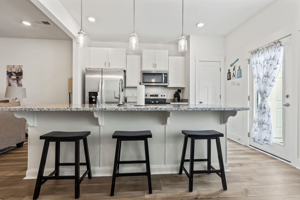 Kitchen island with bar stools