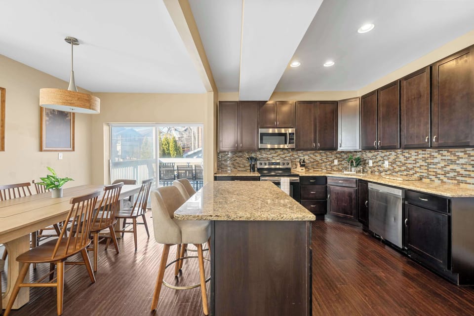 Whether it’s morning coffee or dinner with friends, the open kitchen and dining area make hosting effortless and enjoyable.