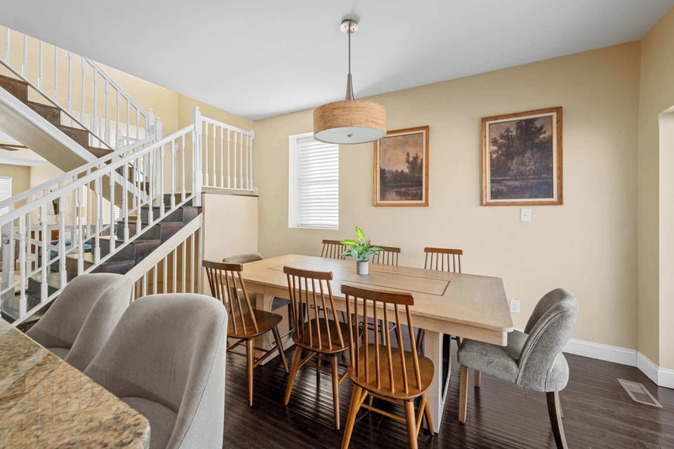 A comfortable dining space that seats your group with ease—ideal for shared meals, game nights, or planning the day ahead.
