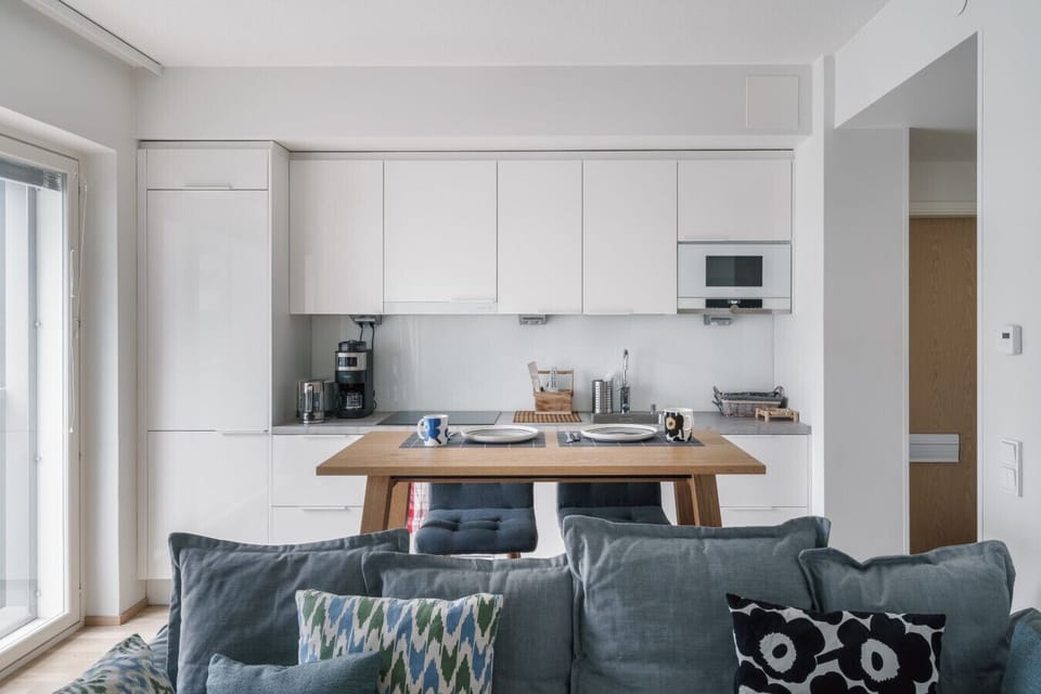 Kitchen stocked with essentials for short or long stays.