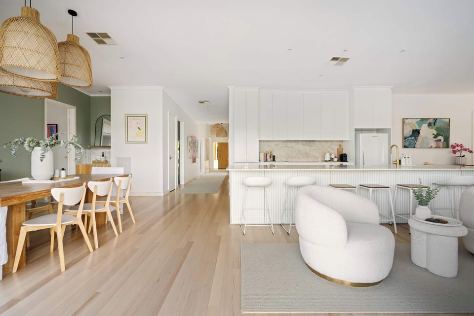 The one story home has a sense of ease, right from the door, through the hall and into the open back area