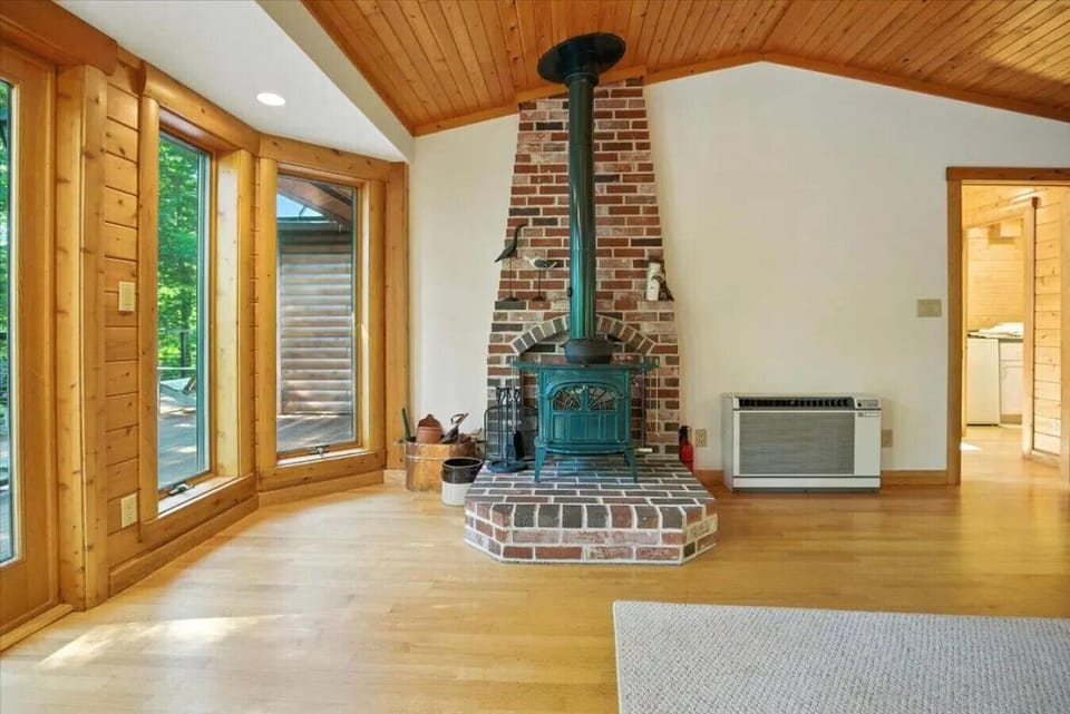 Huge Elegant Master Bedroom with Wood Stove & cozy radiant heating/wood floors