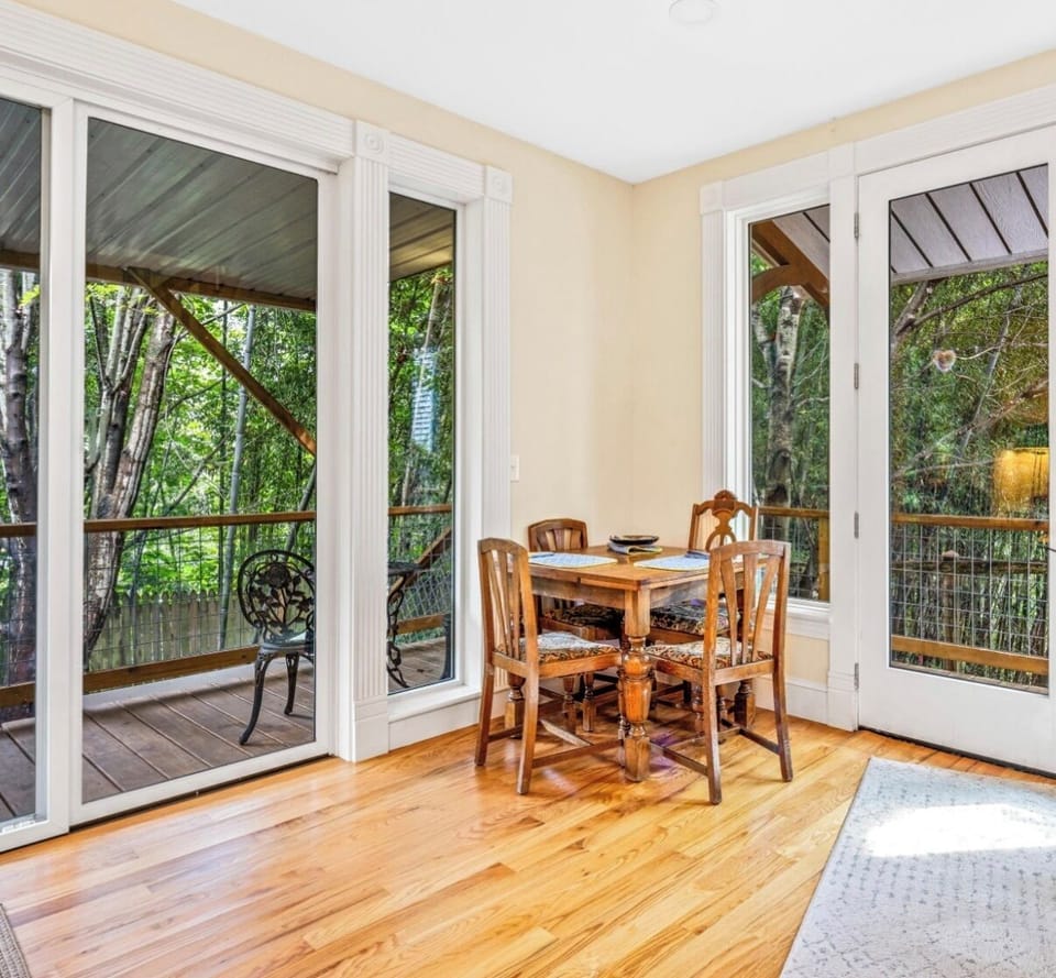 Large open living area with  pub table that expands if needed.