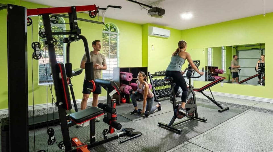 Focused & Fit – A sleek, thoughtfully designed fitness room perfect for energizing workouts anytime.