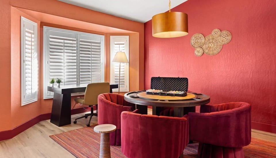 Game On in Style – Enjoy a chic poker table paired with a sleek workspace for the perfect mix of fun and focus.