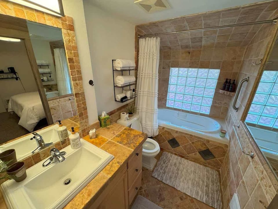 A bright and well-stocked bathroom – perfect for unwinding after the day.