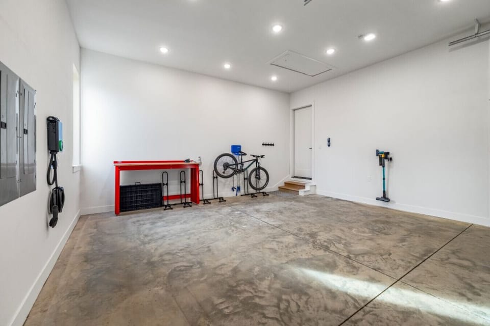 Secure, spacious garage with dedicated storage for bikes and sports equipment—perfect for active groups.