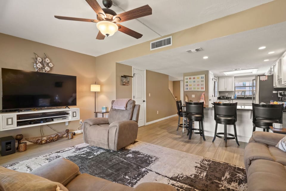 Unwind in the living room after a day of sun and watch your favorite TV shows/movies