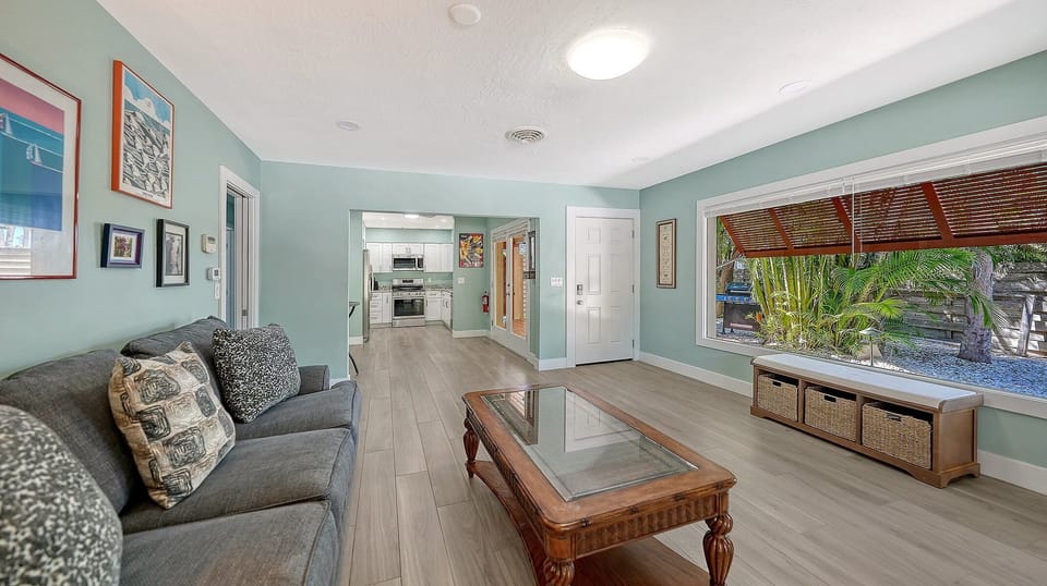 Soft seating and natural light create the perfect place to gather for movies, morning coffee, or simple downtime.