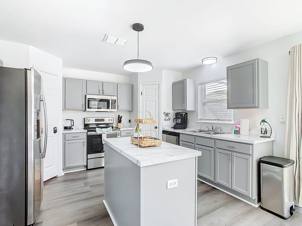 Gourmet kitchen island set up for easy entertaining & everyday meal prep.