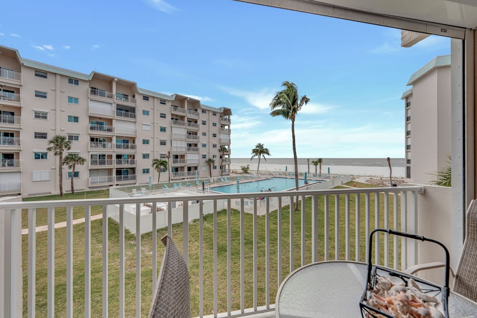 Pool / partial gulf view from your monthly vacation rental