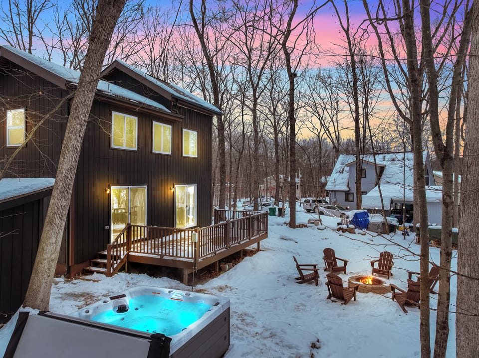 Unwind beneath glowing twilight skies as the hot tub steams and the fire crackles nearby. Tucked among the trees, this cozy retreat invites you to slow down, warm up, and savor peaceful mountain evenings just minutes from local adventures.