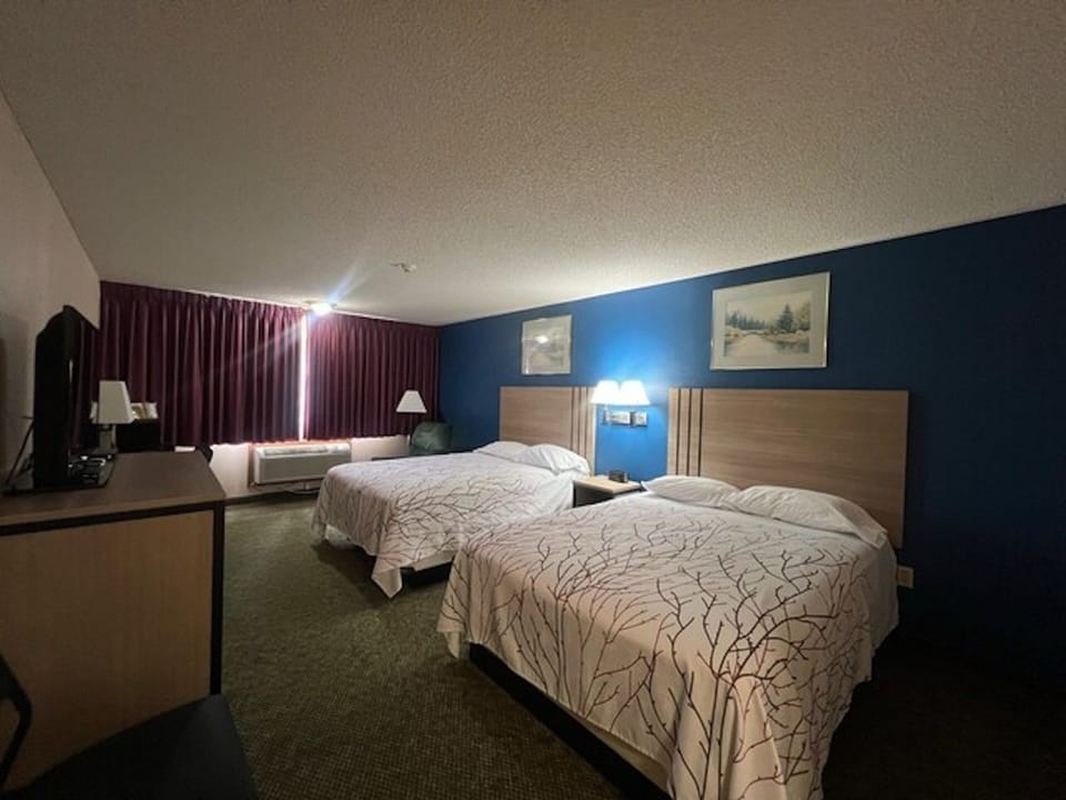 Relax into two comfy beds with plenty of room to move.