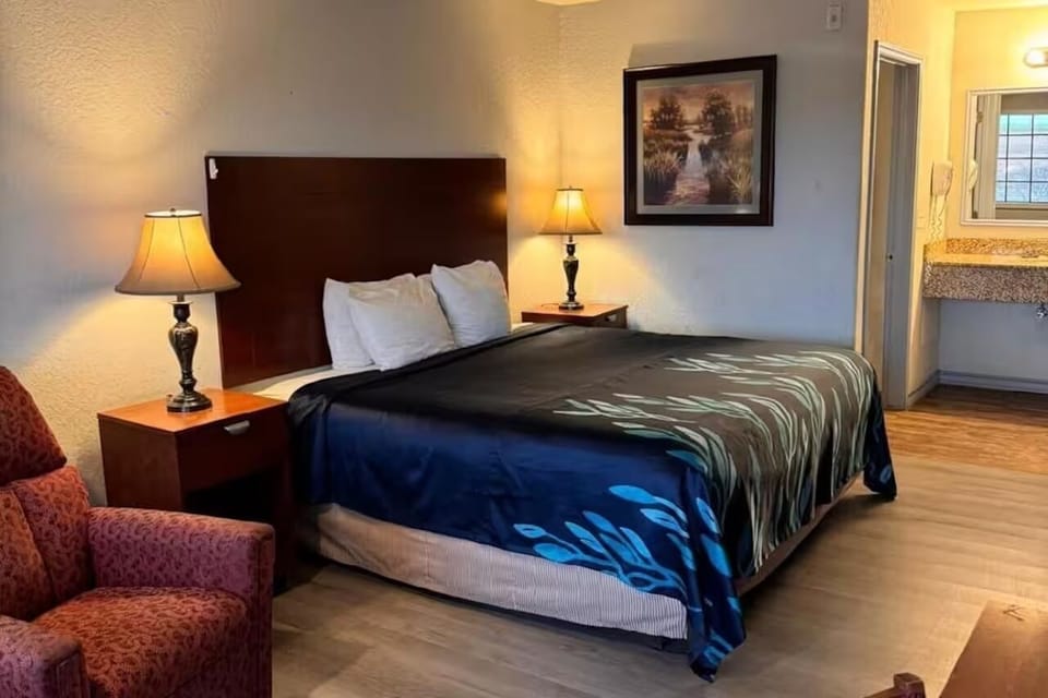 Drift off comfortably in a neatly made king bed.