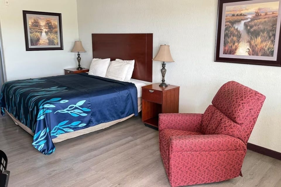 Relax in a spacious room with plush seating and calm vibes.