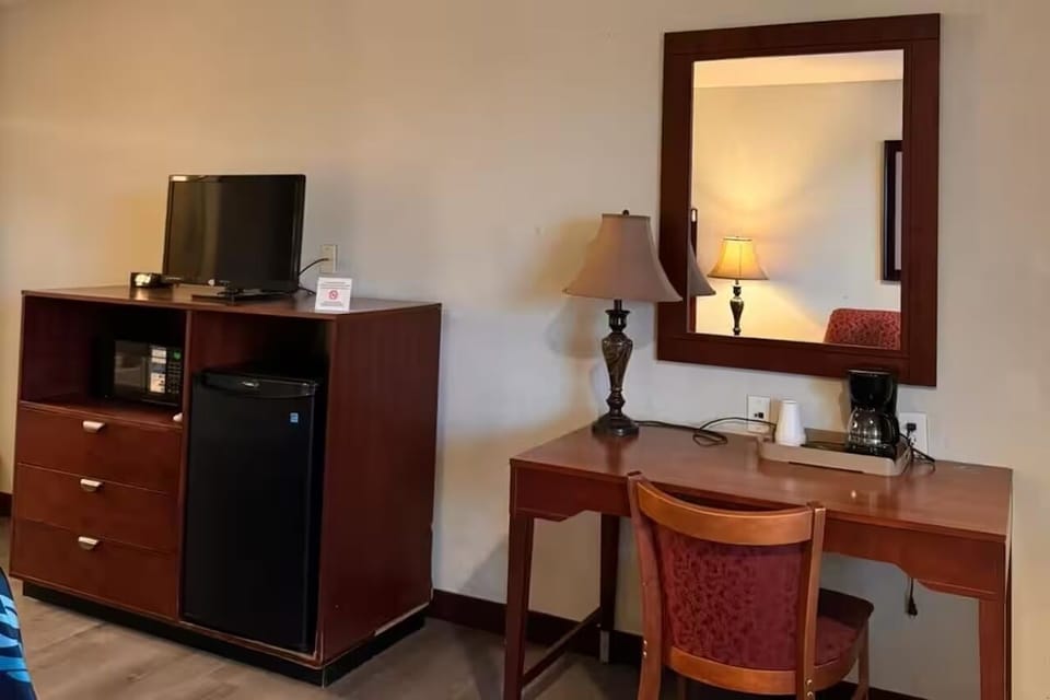 Plan your day at the desk with in-room coffee nearby.