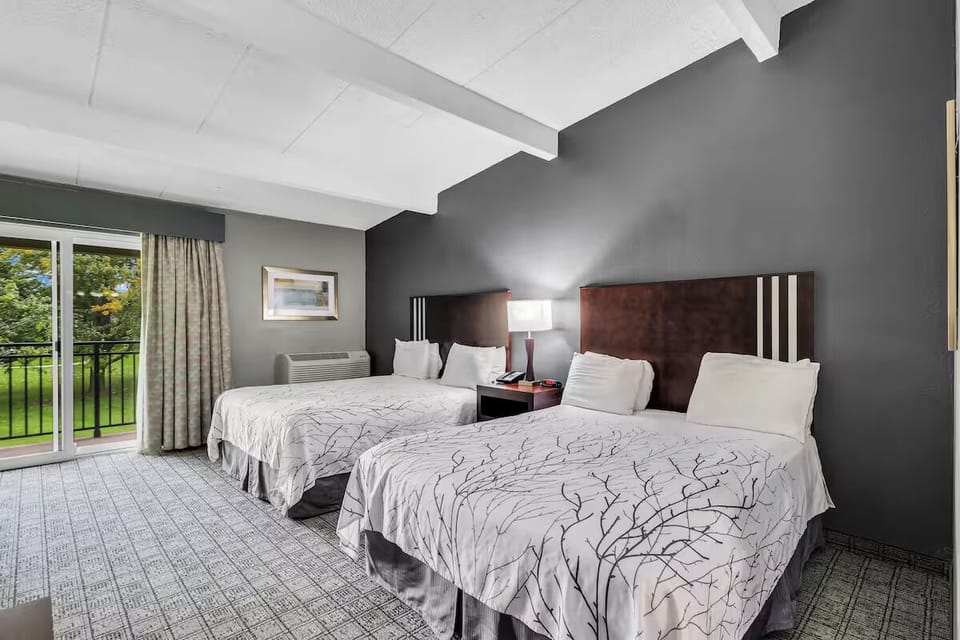 Unwind in a bright double-queen room with balcony views.
