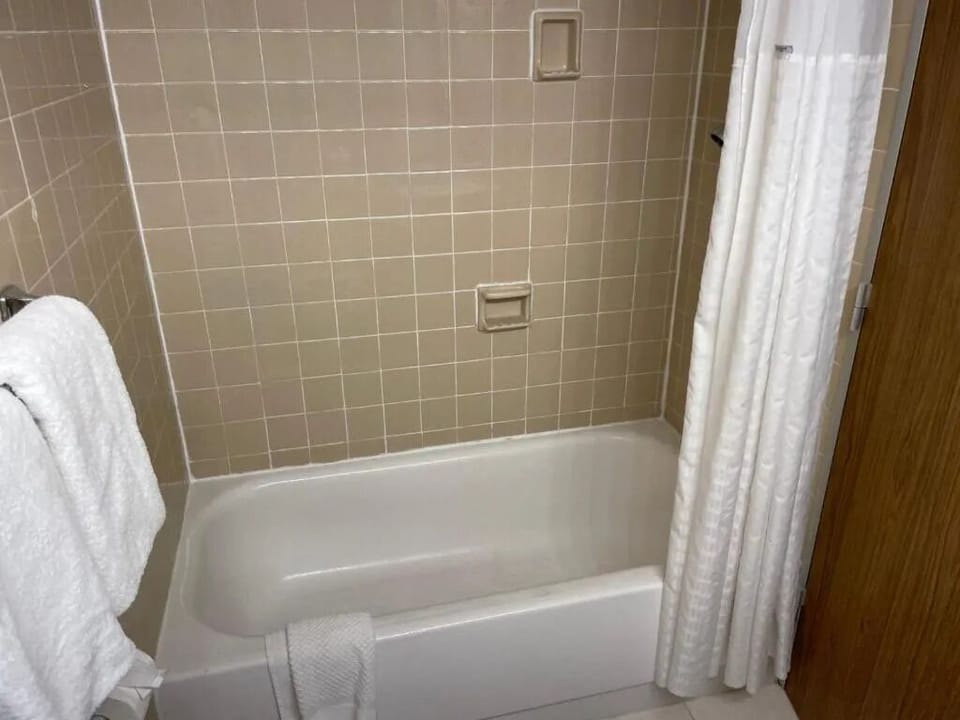 Soak and rinse away the day in a clean tub shower.