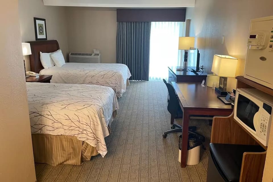 Settle in with two comfy beds and bright morning light.