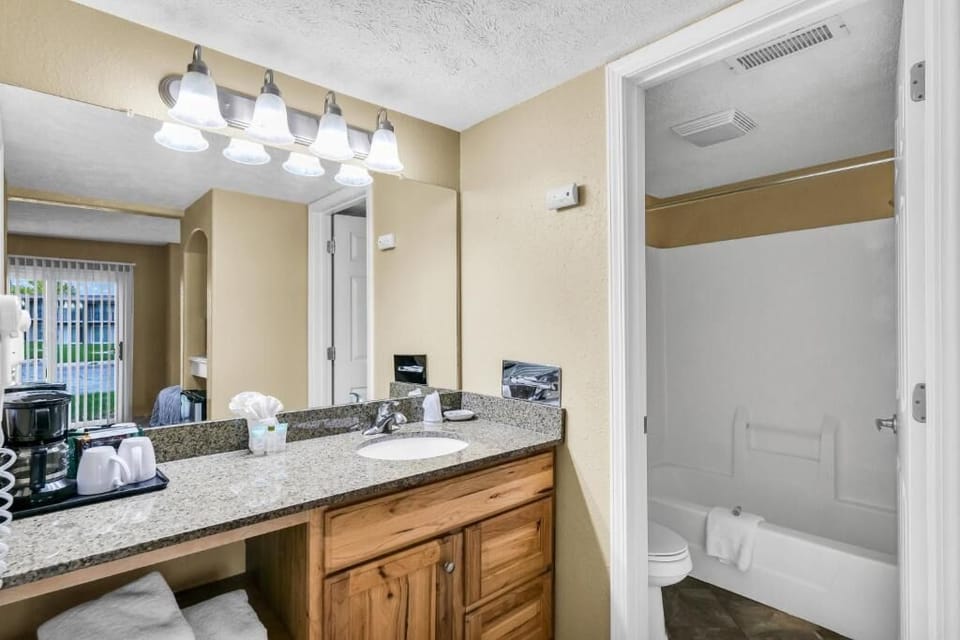 Start your morning feeling pampered under bright vanity lights.
