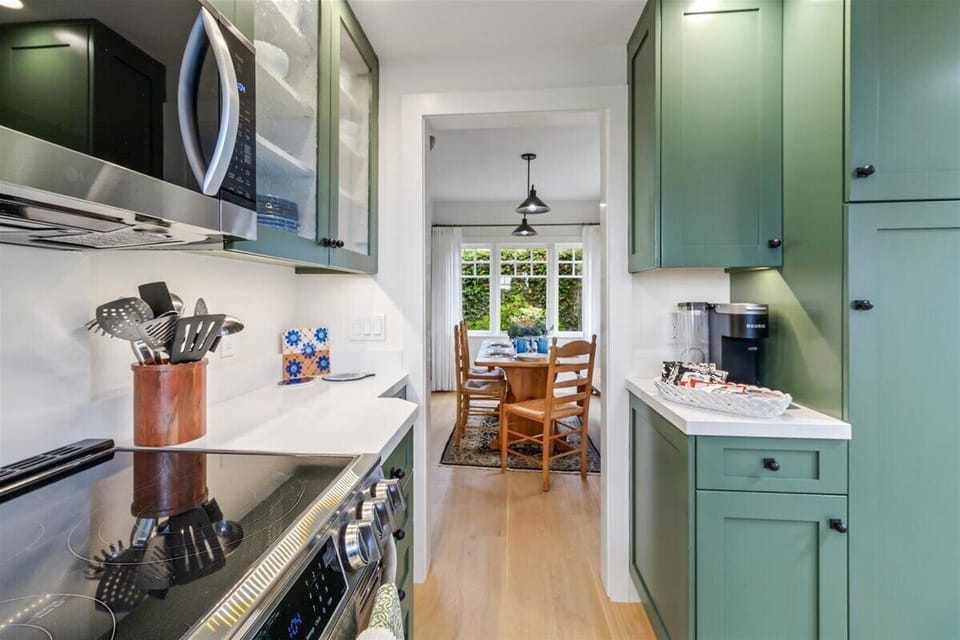 Fully Equipped Kitchen next to the Dining Room