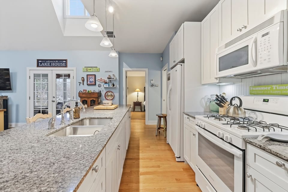 A bright kitchen designed for group cooking and easy flow.