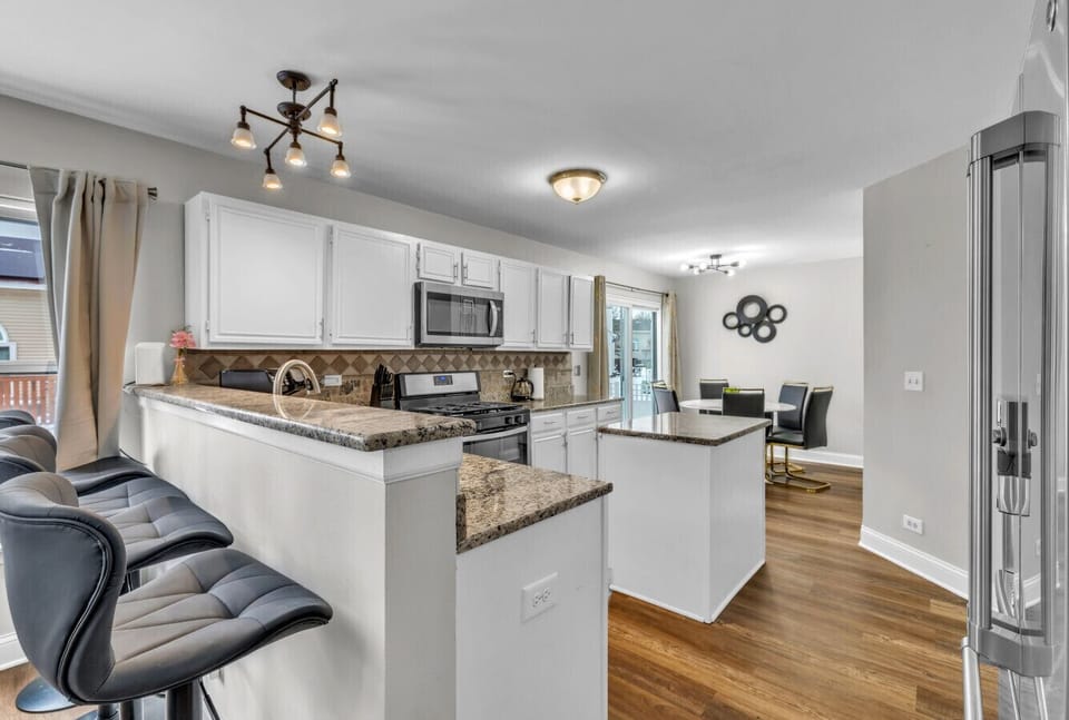 Functional kitchen and counter top dining space with a comfortable layout