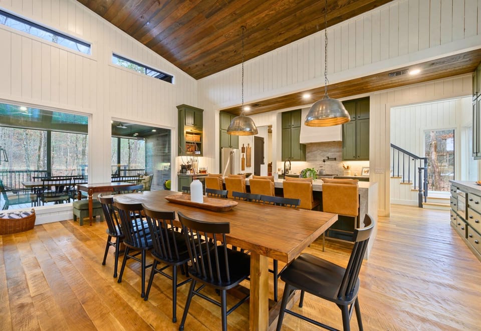 A closer look at the dining setup shows how seamlessly It flows into the kitchen and living spaces.