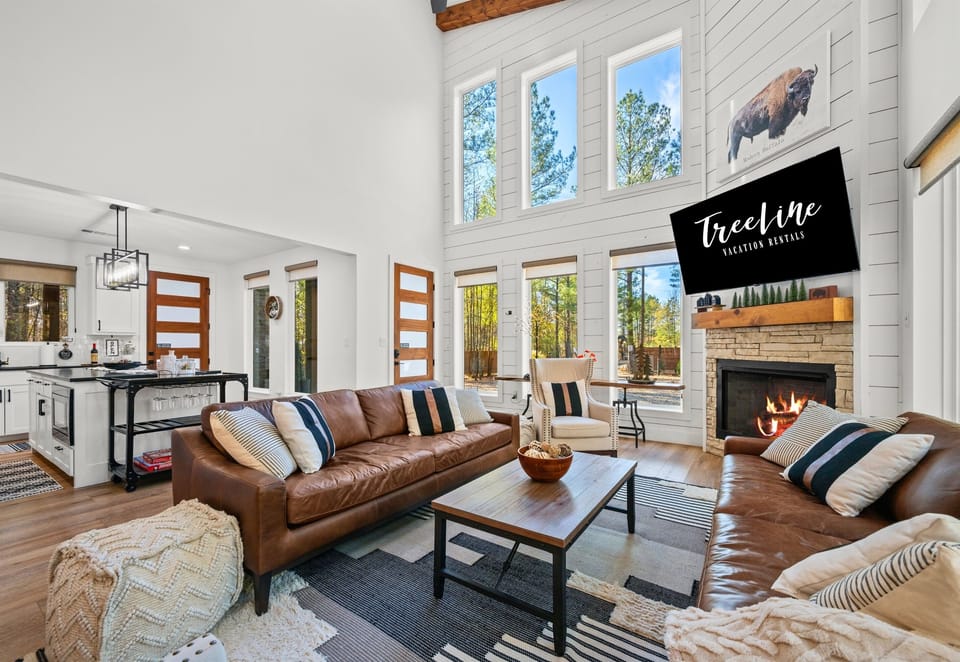 From this angle, the open layout shows how seamlessly the living room connects to the kitchen and dining space.