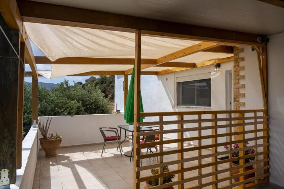 Covered outdoor seating area, perfect for relaxing moments