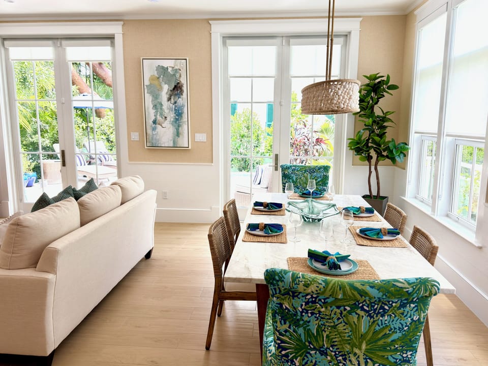 Open-concept dining area with seating for 6, perfect for meals and gathering.