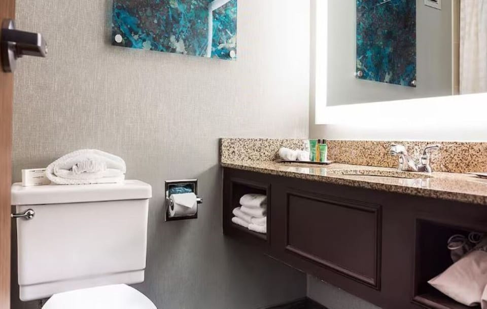 Refresh each morning with bright vanity space and fluffy towels.