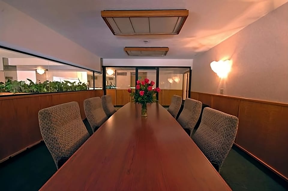 Gather your team around a polished table for productive meetings.