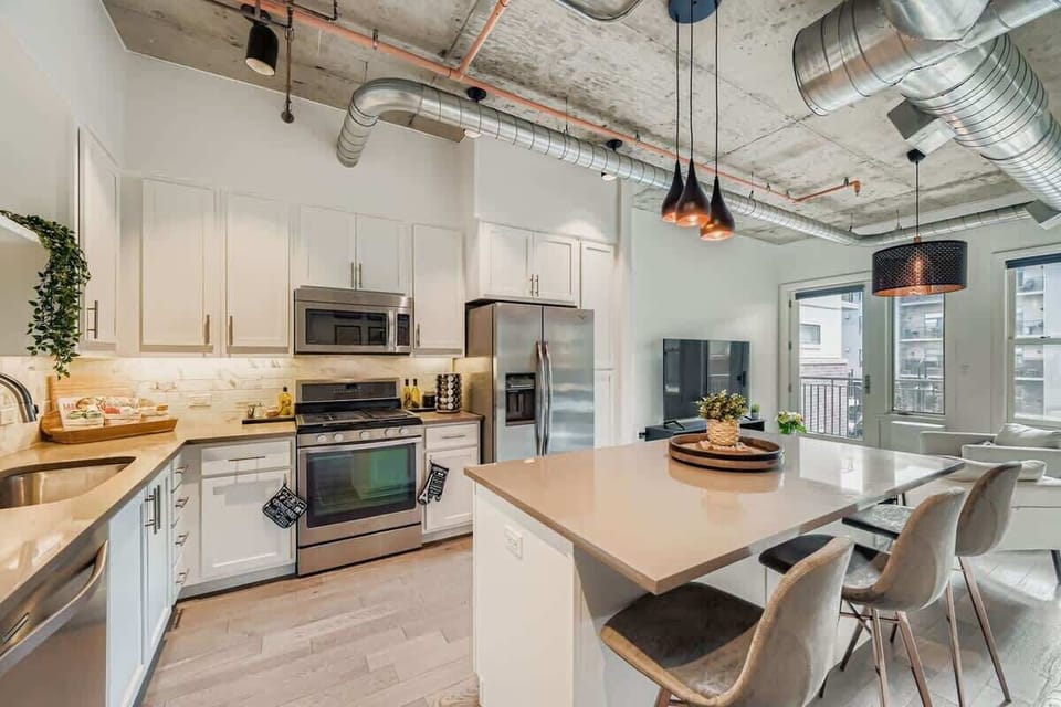 Fully equipped kitchen featuring all essentials—pots, pans, utensils, and appliances—ready for effortless cooking and dining.
