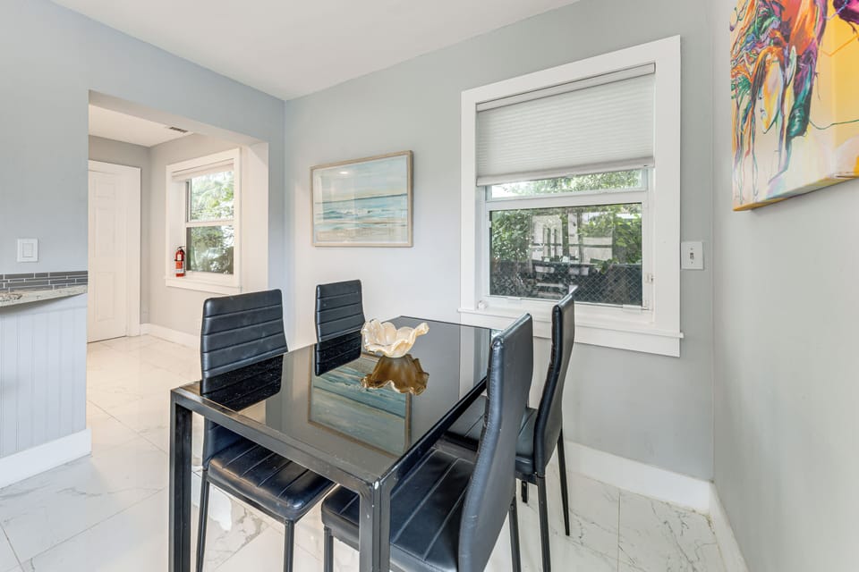 Dining Room | 2 Dining Tables | Breakfast Bar | Dishware/Flatware Provided