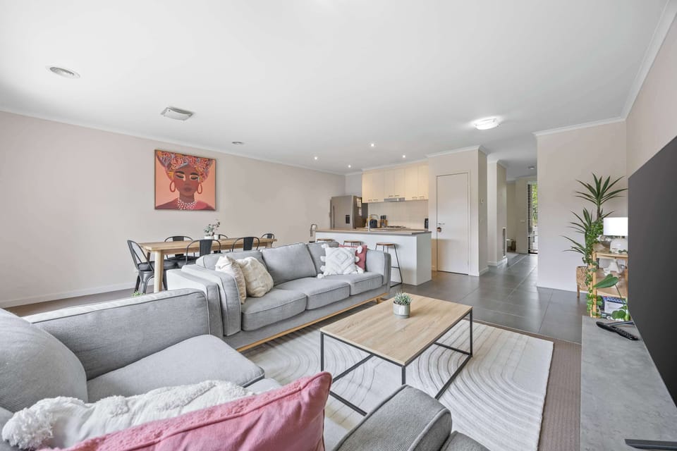 Open plan living, dining and kitchen space.