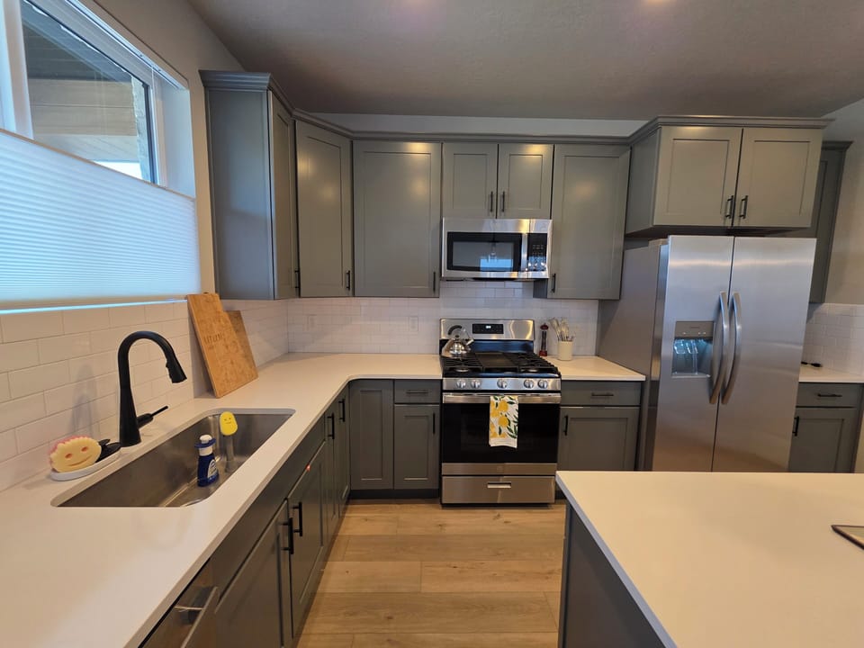 Kitchen & island with three barstools