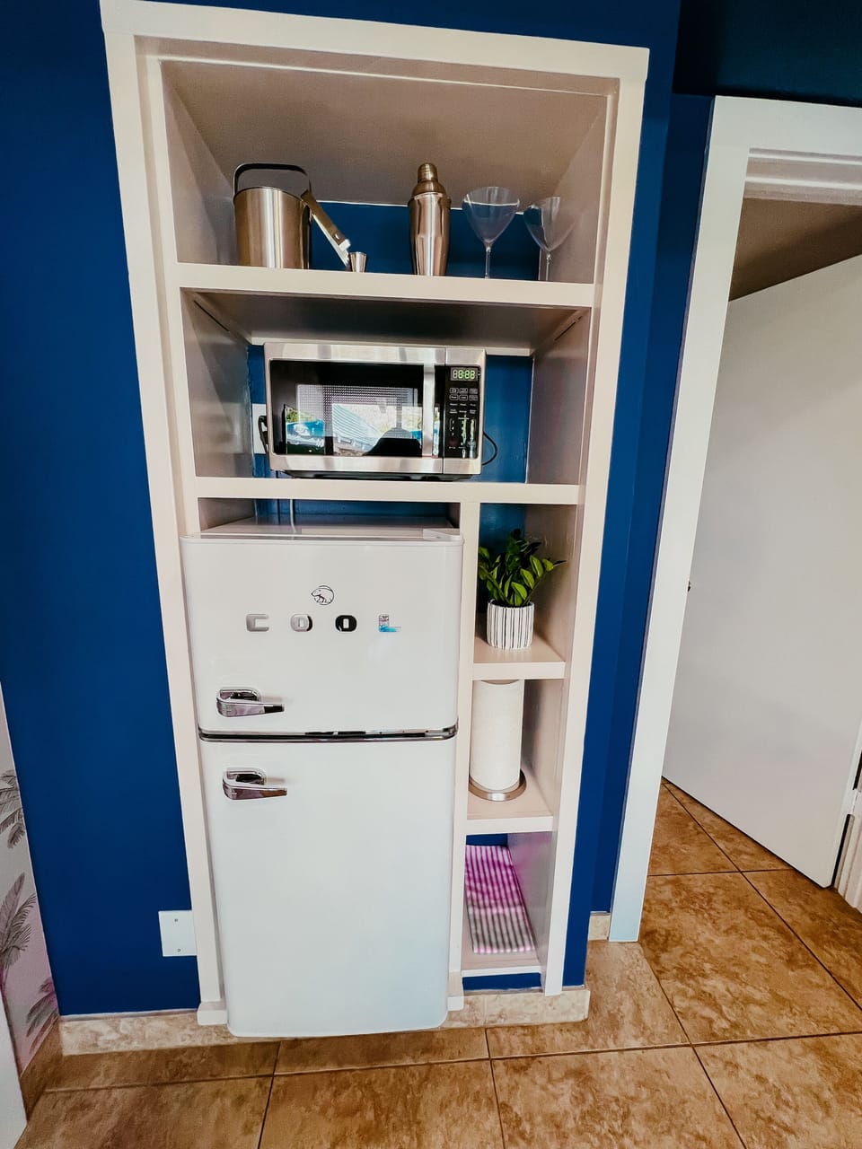 Mini-bar Essentials: Compact and stylish. Comes equipped with a fridge, microwave, and bar tools for your stay.