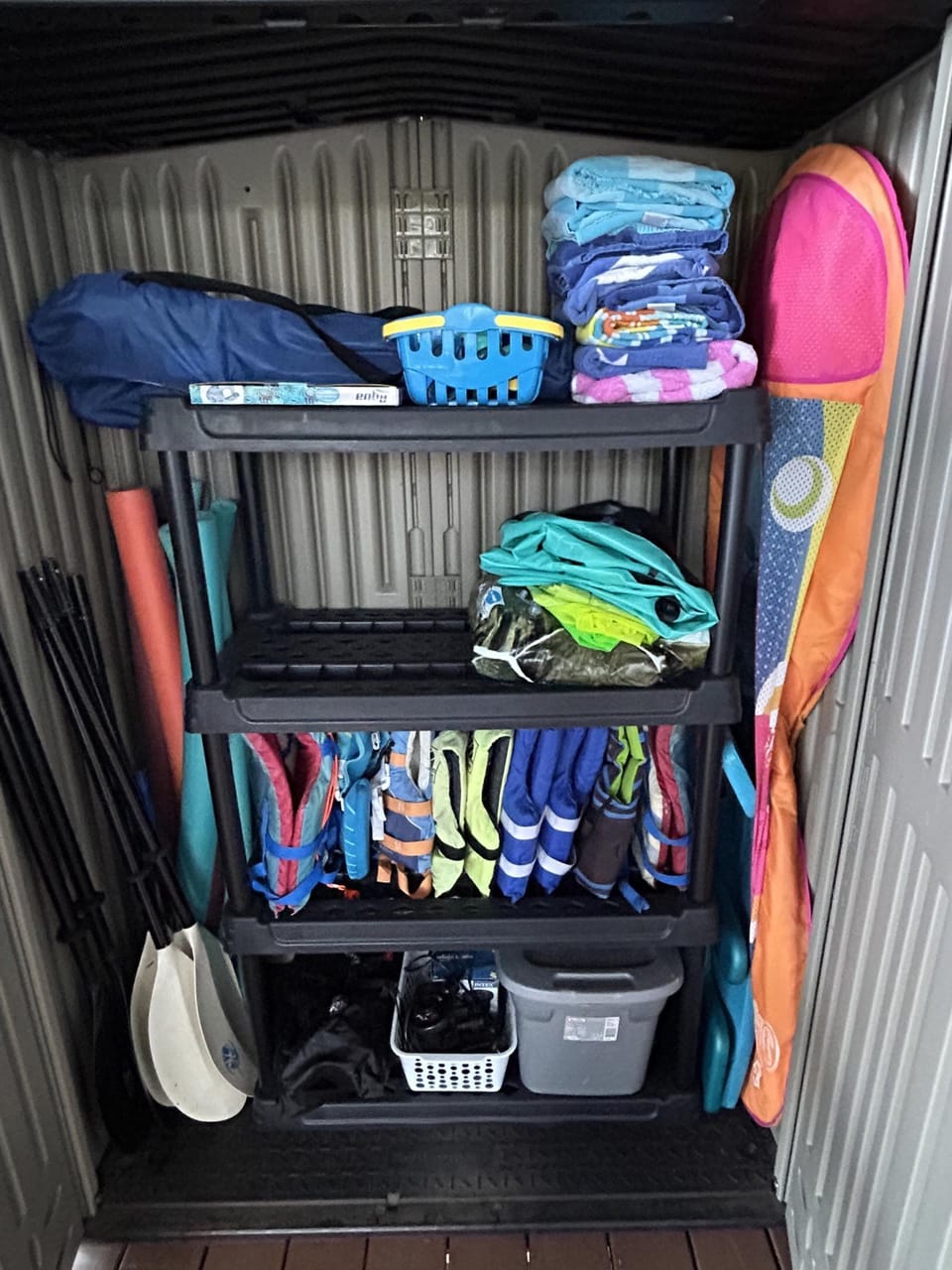 Closet with kayak oars, life jackets, and other water sports equipment 
Please put back when finished using 