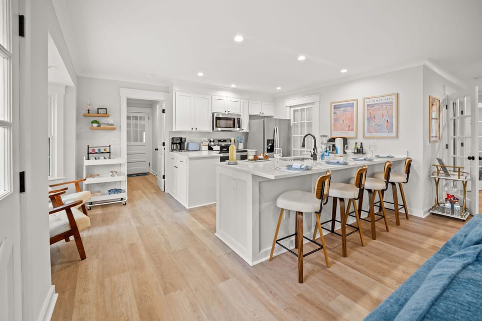 Spacious Kitchen & Nook, along with Entrance to the Laundry Room, Garage & Backyard