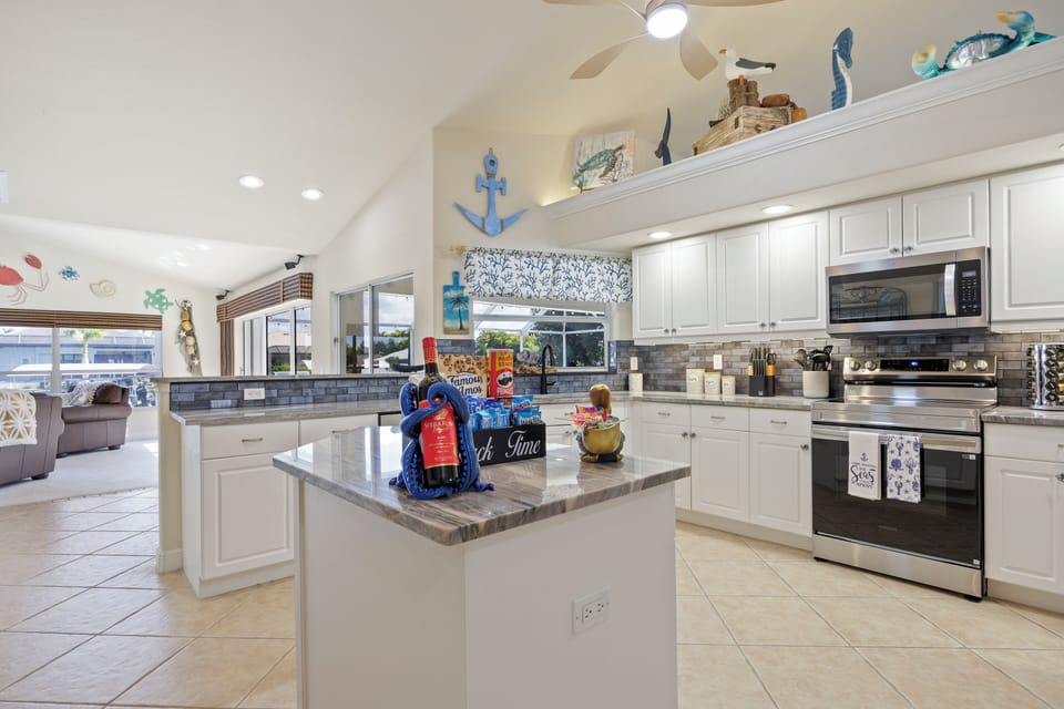 Kitchen with granite counter tops and stainless steel appliances