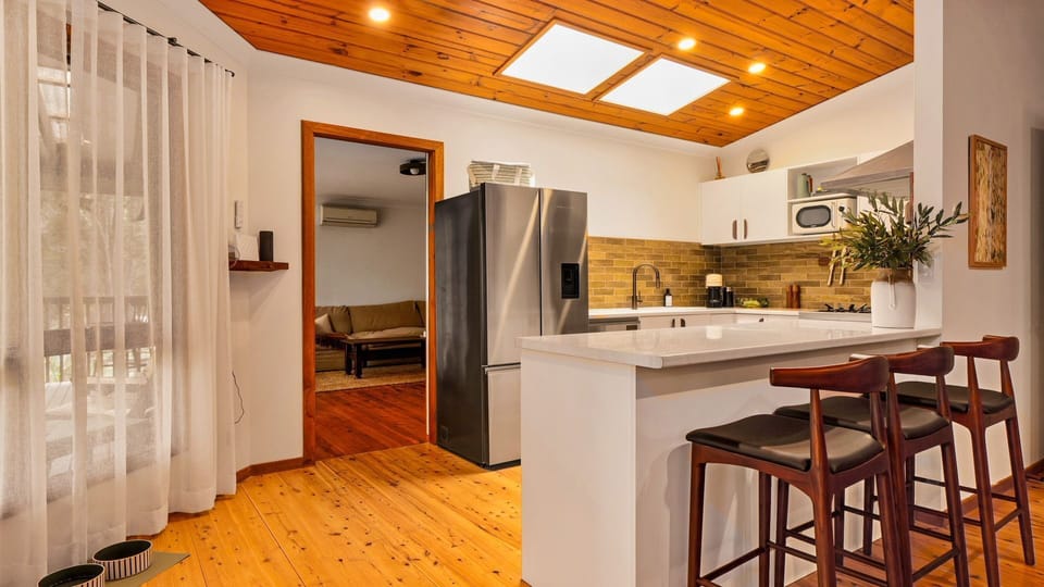 A bright, clean kitchen designed for easy and comfortable cooking.