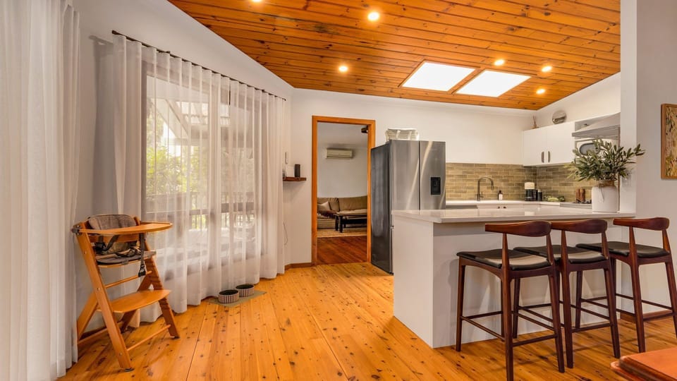 Cook, gather, and enjoy time together in this cozy kitchen space.