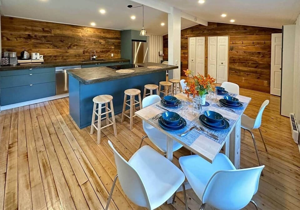 Fully renovated kitchen with restored hard-wood floor.