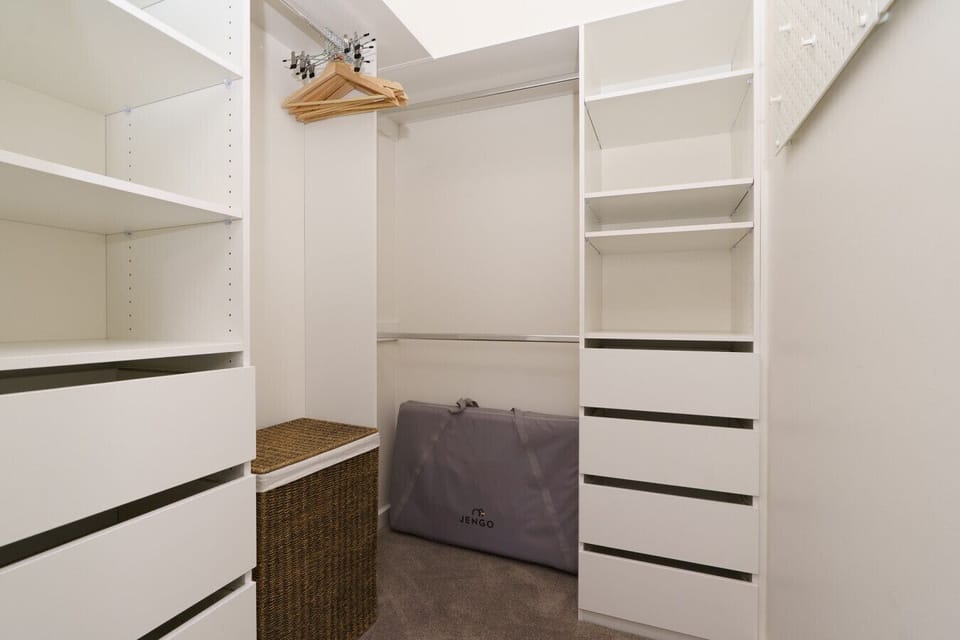 Unpack, organize, and settle in. A spacious wardrobe that makes longer stays feel seamless.