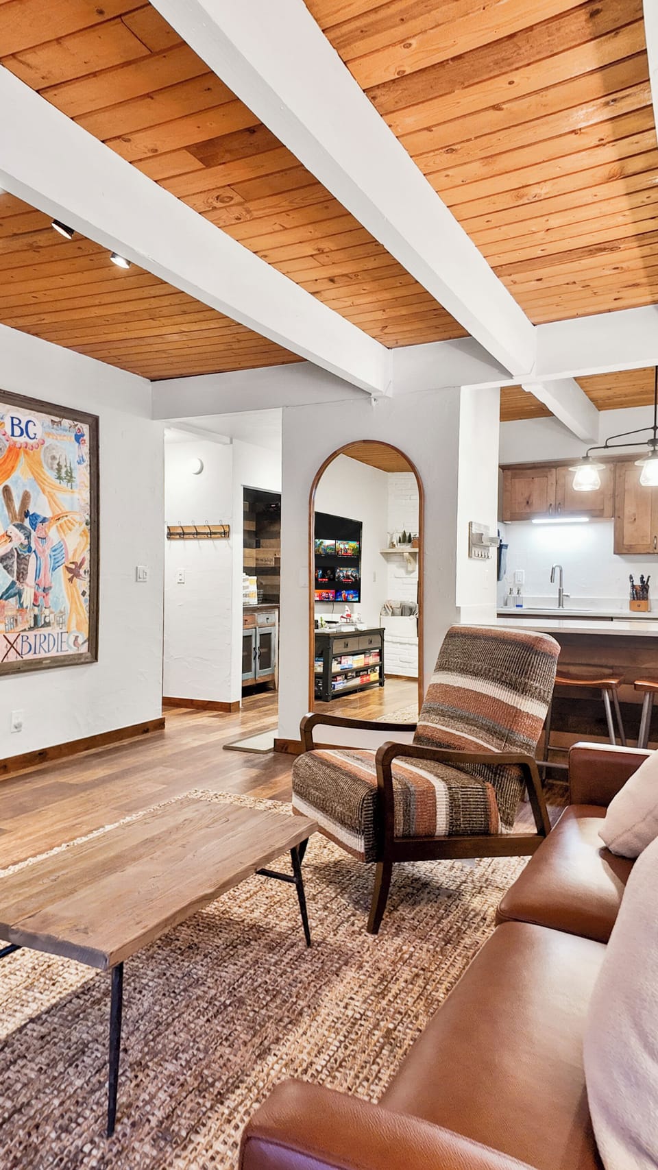 Open Concept: Seamless flow from the cozy lounge to the kitchen.
