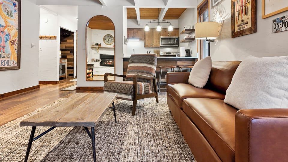 Modern Comforts: Plush leather seating and elegant lighting for cozy nights.
