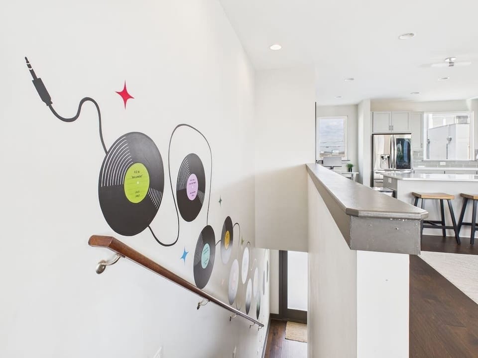 Eye-catching music-themed mural along the staircase.